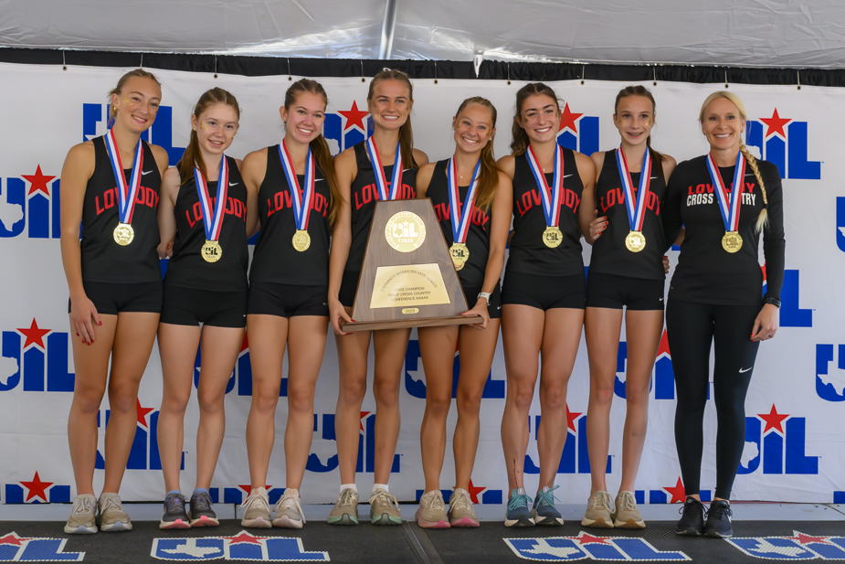 Lovejoy girls championship runners with coach